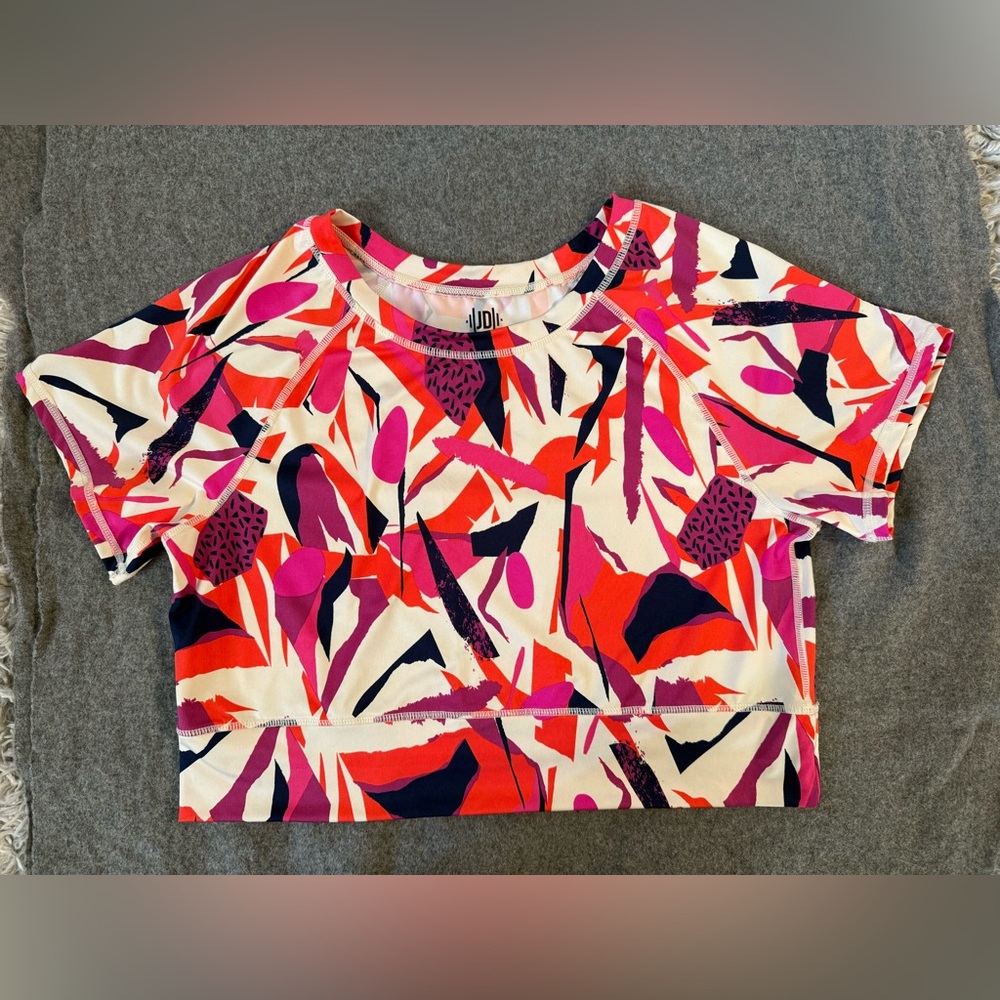 This J Dow Fitness crop top features a geometric design.